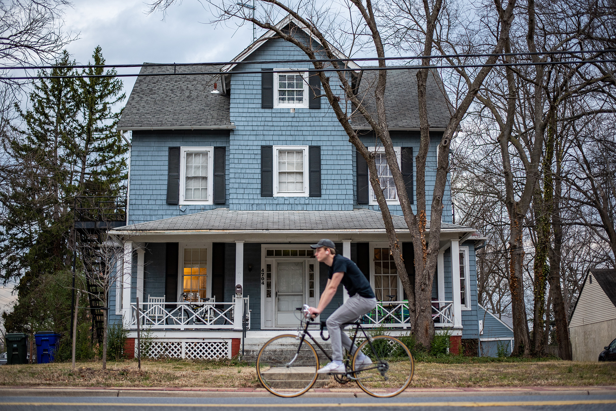 Biker outside 4704 Calvert Road