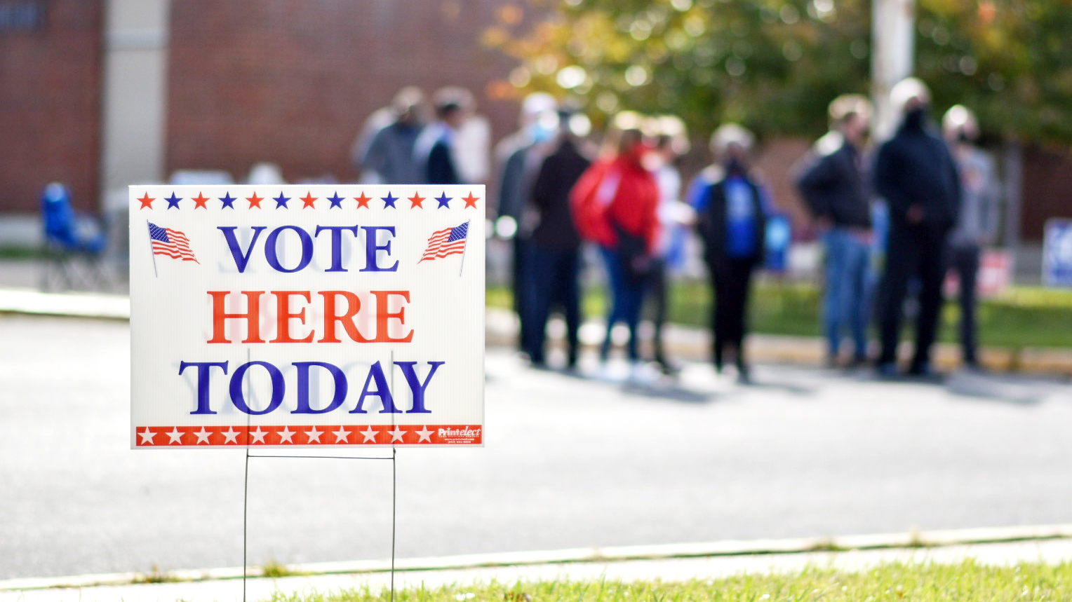 Vote here sign